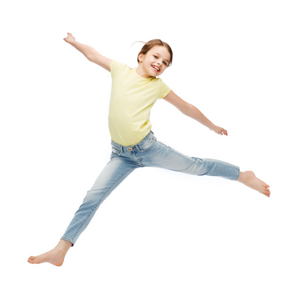 smiling little girl jumping - 写真・画像