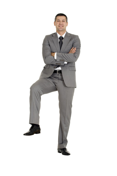Businessman with a foot on a step - Zdjęcie, obraz