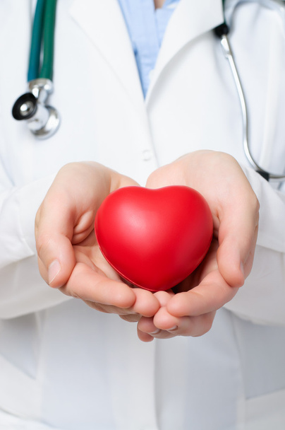 Doctor protecting a heart - Photo, Image