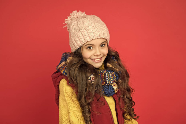 cheerful child girl with long hair and warm clothing, smiling beauty - Fotoğraf, Görsel