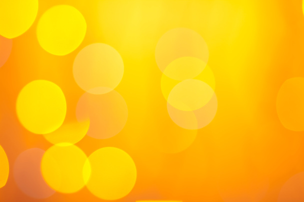 abstraktní slunné bokeh na oranžové - Fotografie, Obrázek