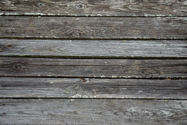 Horizontal texture of old gray wooden planks  - Photo, image
