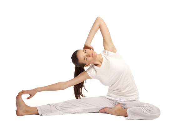 beautiful girl is engaged in yoga - Foto, afbeelding