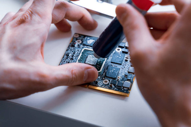 Solutions services electronic hardware. Engineer technician man upgrade and maintenance digital pc. Technology chip equipment repair - Foto, immagini