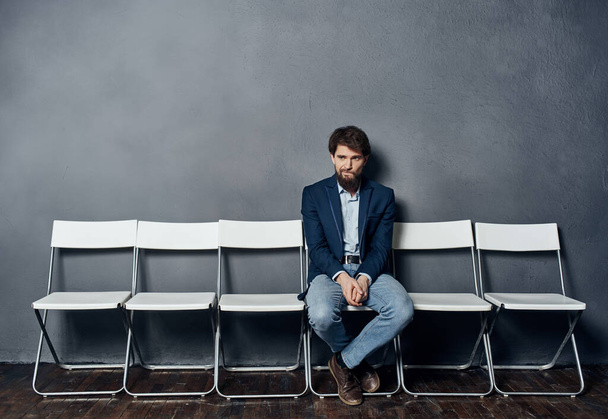 Business man sitting on chair waiting for job interview professional - Фото, зображення