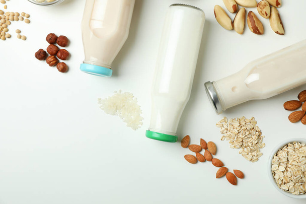 Concept of vegan milk on white background, top view - Valokuva, kuva