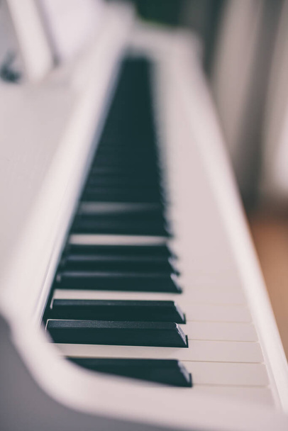 Classic white piano keyboard close-up - Photo, Image