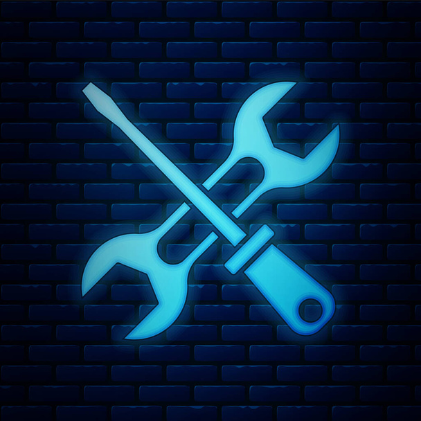 Glowing neon Screwdriver and wrench spanner tools icon isolated on brick wall background. Service tool symbol.  Vector. - Vector, Image