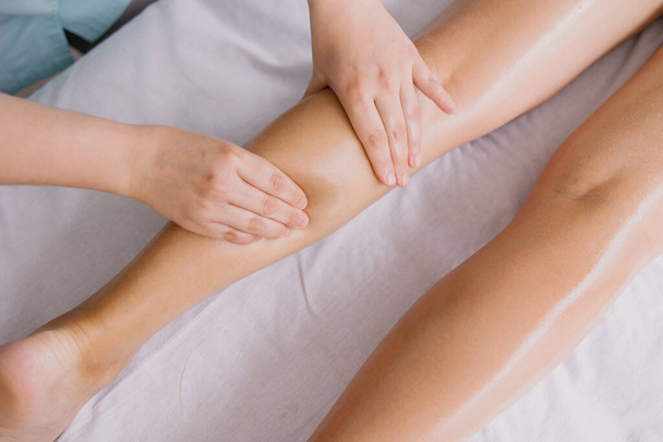 woman getting massage in spa salon - Foto, immagini