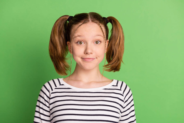 Photo of nice blond hairdo small girl wear striped sweater isolated on green color background - Valokuva, kuva