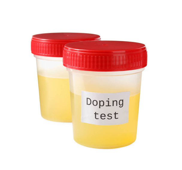 Słoiki z moczem ze słowami test dopingowy izolowany na białym - Zdjęcie, obraz