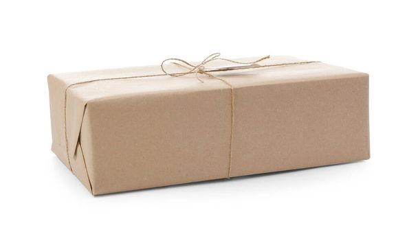 Beyaz arkaplanda paketlenmiş paket - Fotoğraf, Görsel