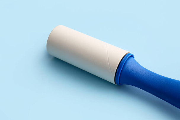 Lint roller on color background - Photo, Image