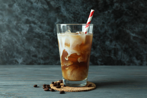Concept of cold drink with ice coffee on wooden table - Foto, Imagen