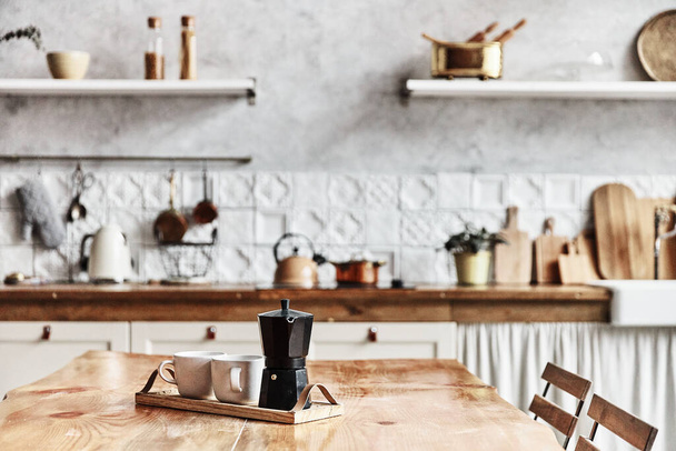 Vintage kitchen interior, wooden table and cutlery, noise - Foto, imagen
