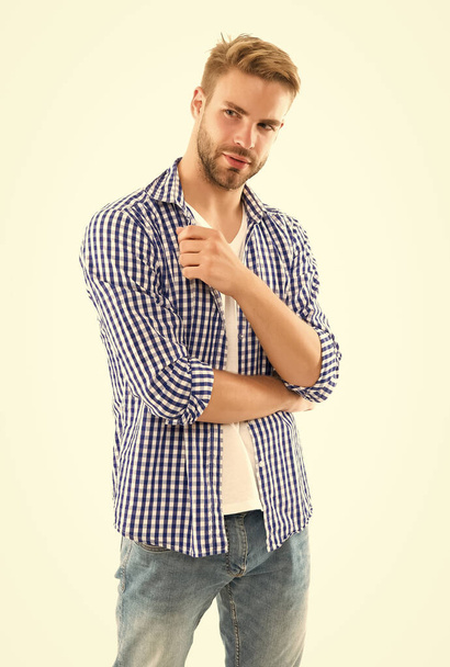 skin and hair care. handsome young man wear checkered shirt. casual male fashion style. unshaven guy has groomed hair isolated on white background. hairdresser service concept. spring style - Photo, Image