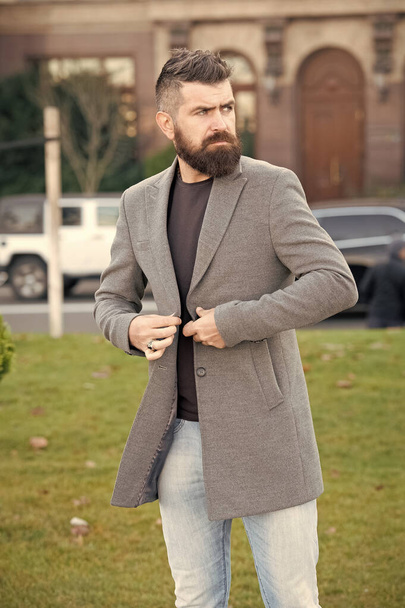 brutal mature bearded man with moustache walking outdoor in trendy modern casual jacket, perfect style - Fotografie, Obrázek