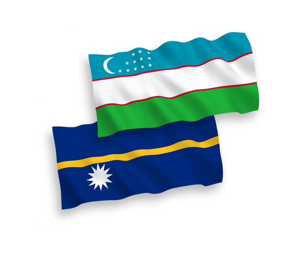 National vector fabric wave flags of Republic of Nauru and Uzbekistan isolated on white background. 1 to 2 proportion. - Vektor, kép