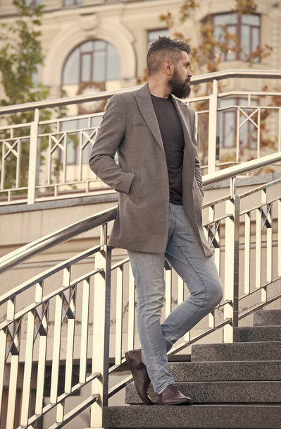 brutal mature bearded man with moustache walking outdoor in trendy modern casual jacket, mens beauty - Φωτογραφία, εικόνα