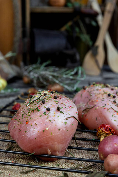  Fresh raw chicken breast with herbs and spices in the kitchen - Foto, Imagem