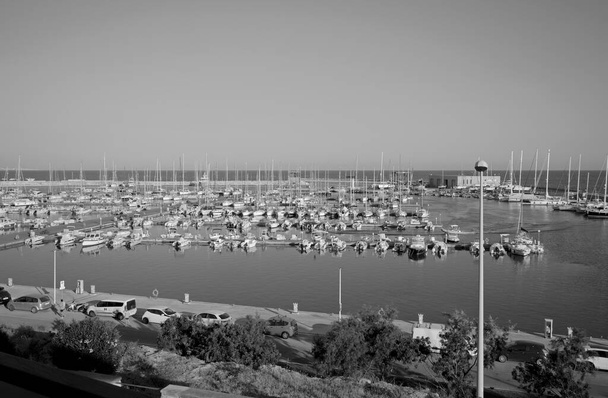 Italy, Sicily, Mediterranean sea, Marina di Ragusa (Ragusa Province); motor boats and luxury yachts in the port  - Photo, Image