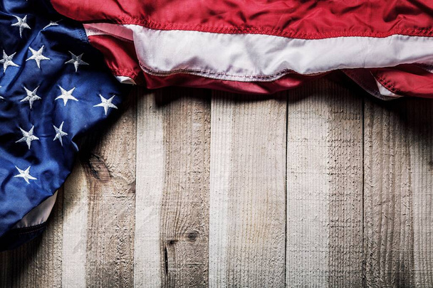 Classic American flag on wooden background - Фото, изображение