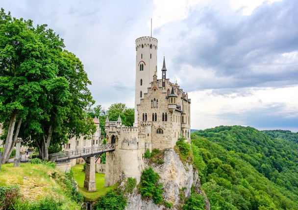 Romantic Castle Schloss Lichtenstein with a bridge on the top of mountain. Baden-Wurttemberg, Germany - Photo, Image