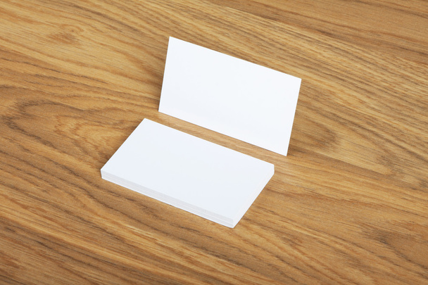  blank business cards on a wooden background - Photo, Image