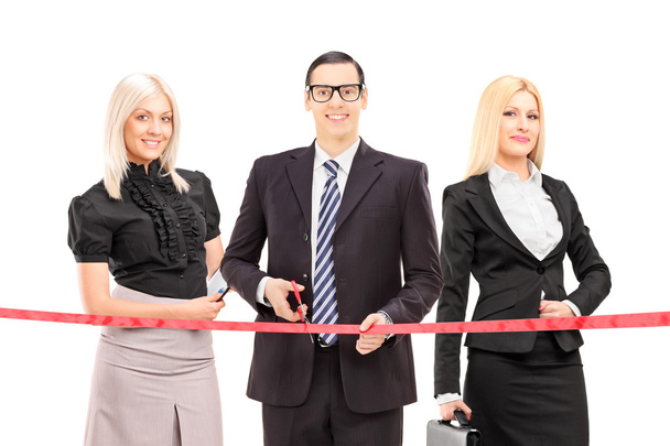 Business people cutting red tape - Foto, Imagem