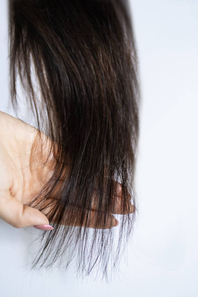 Fake Woman Hair. False Healthy Of Long Hair - Foto, Bild