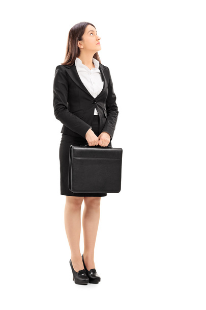 Businesswoman holding briefcase - Photo, Image