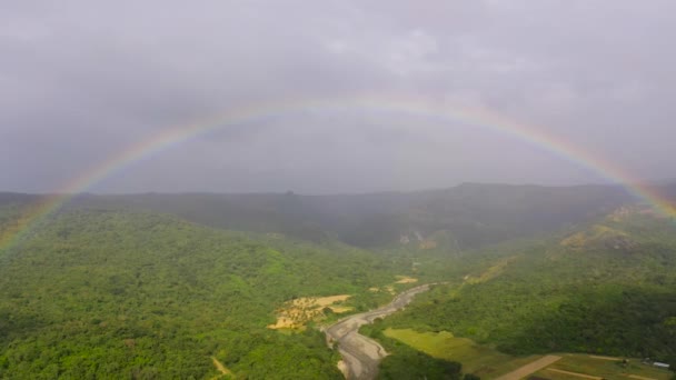 Rainbow in a mountain valley, after rain, top view. - Footage, Video