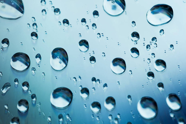 Rain drops on window in summer rainy day - Foto, Bild