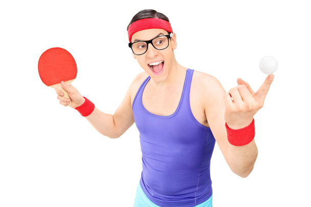 Man holding ping pong bat - Fotoğraf, Görsel