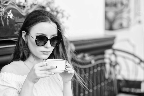 girl relax in cafe. Business lunch. morning coffee. Waiting for date. good morning. Breakfast time. summer fashion. Meeting in cafe. stylish woman in glasses drink coffee. Morning starts with coffee. - Фото, изображение