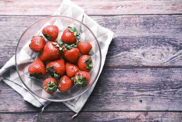 fresh strawberry in a bowl on table  - Фото, зображення
