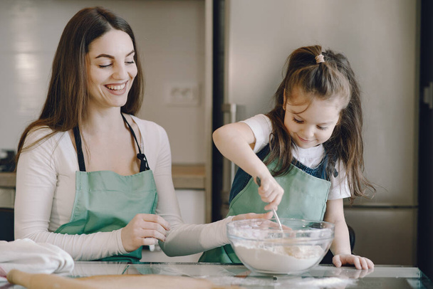 Family cook the dough for cookies - 写真・画像
