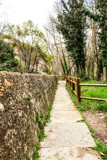 Mountain landscape and path between with green vegetation in spring in Castilla la Mancha, Spain - Fotografie, Obrázek