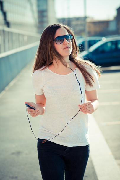 young beautiful woman listening music - Photo, Image