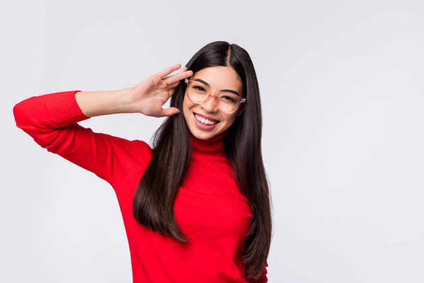 Photo of happy smiling cheerful pretty lovely chinese girl in glasses wear red turtleneck isolated on grey color background - Fotoğraf, Görsel