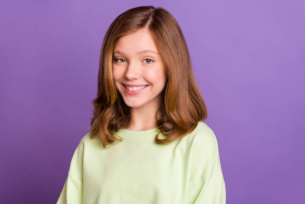 Photo of young attractive pretty lovely girl happy positive smile brown hair isolated over purple color background - Foto, Imagem