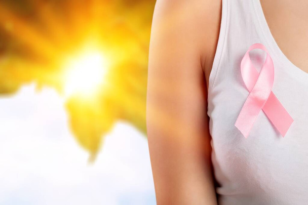 Cancer Awareness month, Woman with colored Ribbon for supporting people. - 写真・画像