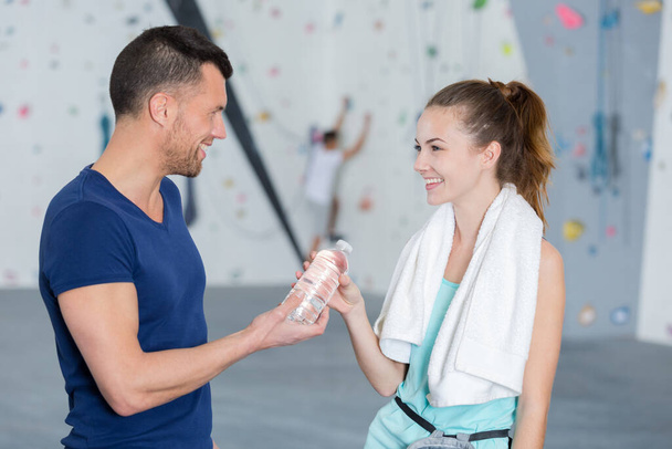 attractive young sports people are talking and smiling - Fotoğraf, Görsel