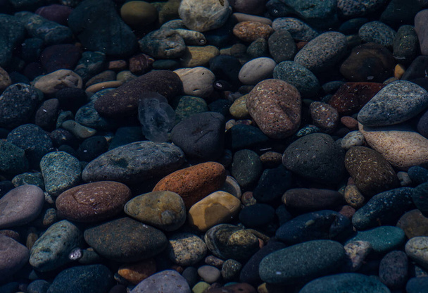 Strand zee stenen als een natuurlijke textuur achtergrond - Foto, afbeelding