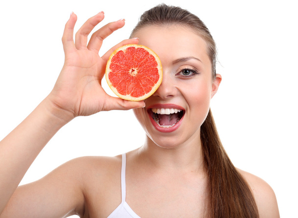 Beautiful girl with grapefruit - Фото, зображення
