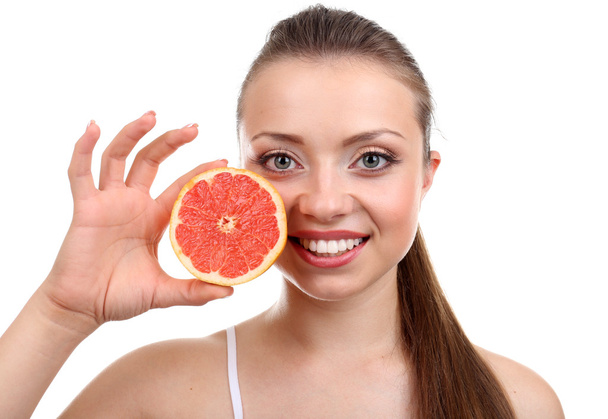 Beautiful girl with grapefruit - Valokuva, kuva