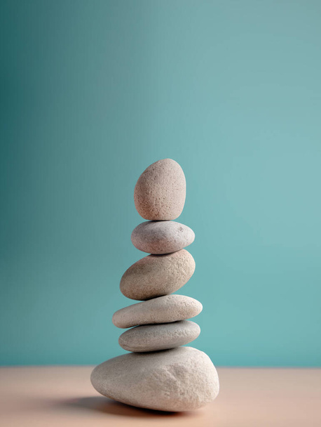 Harmony, Calm, Mind, Life Relaxing and Living by Nature Concept. High Natural Stone Stack. Balancing Body, Mind, Soul and Spirit. Mental Health Practice. Clean and Soft tone. Vertical image - 写真・画像