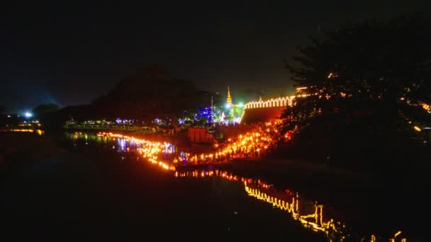 4k Video Time lapse, Krathong Sai Floating at Pra Tu Tha Nang in Lamphun province, Thailand. Krathongs made from coconut shells, a local wisdom that has been passed through generations - Πλάνα, βίντεο