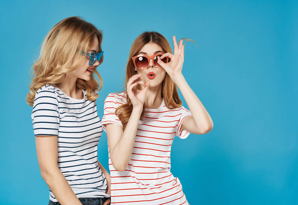 funny girlfriends in striped t-shirt black glasses emotions message - Φωτογραφία, εικόνα