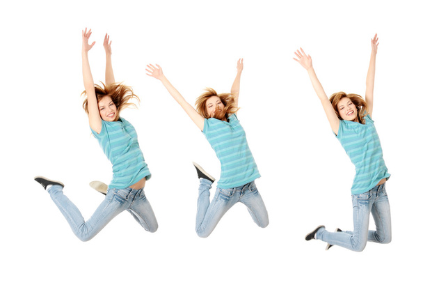 Jumping happy teen girl, isolated on white background - Фото, изображение
